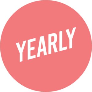 Yearly Logo - pink circle with white slanted text.