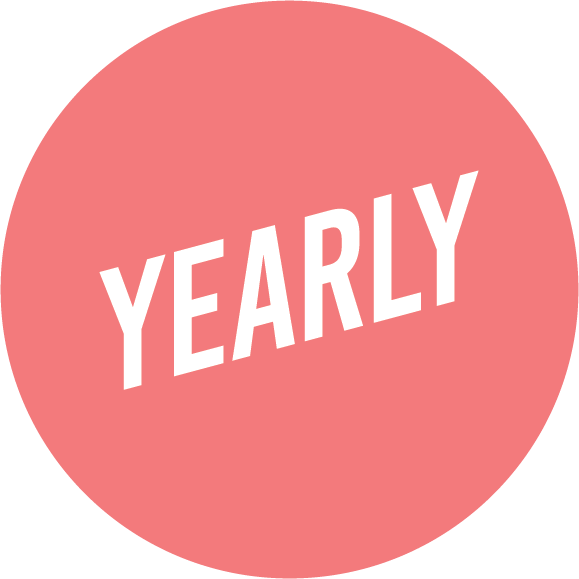 Yearly logo, pink circle with white slanted text yearly.
